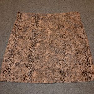 Tilly’s snake print mini skirt